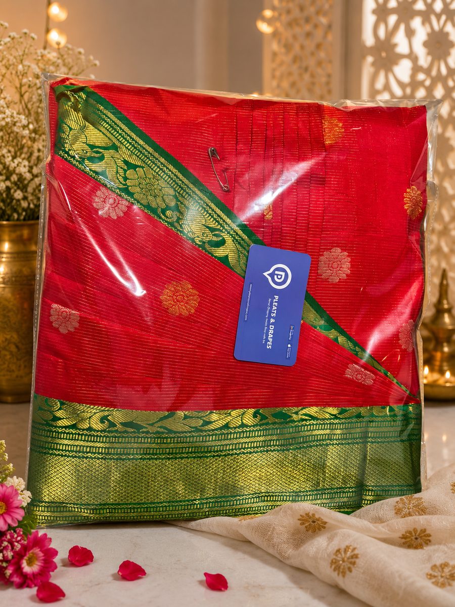 Sarees wrapped in soft muslin and stored flat in a breathable box